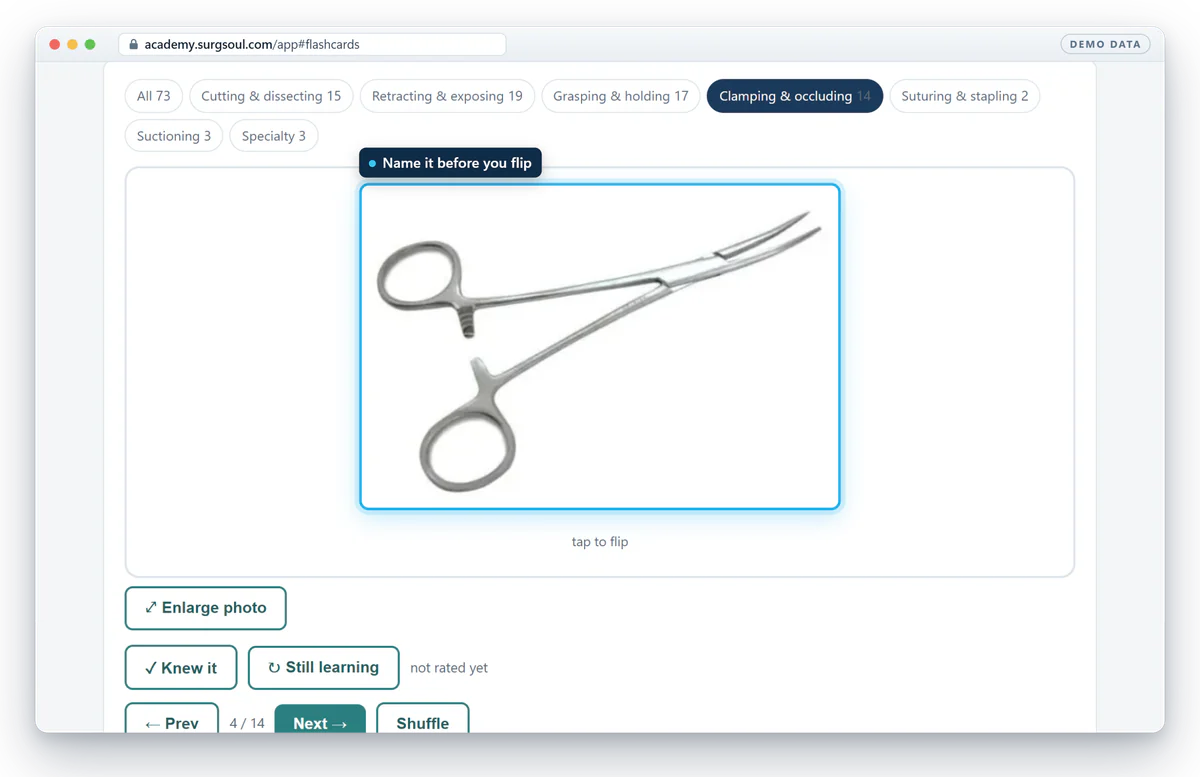 An instrument flashcard showing a photo of a curved hemostat, filtered to the Clamping and occluding category.